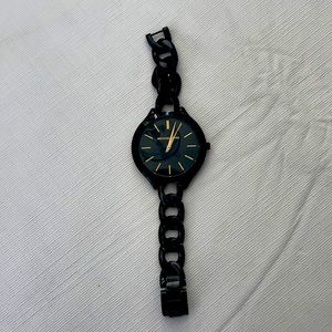 Black link Michael Kors watch.
